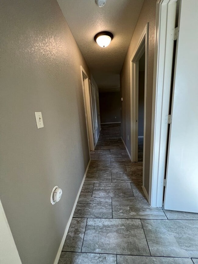 Building Photo - 3 Bed 1.5 Bath House, 1 Car Carport, Yard Care Included.