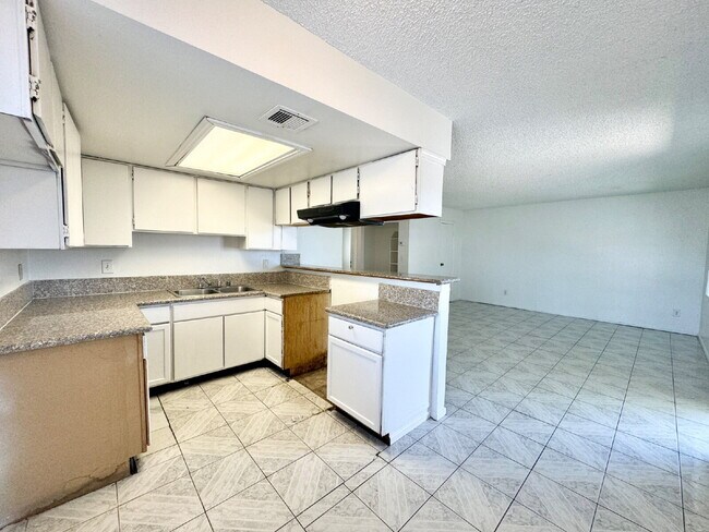 Building Photo - DOWNSTAIRS CONDO | RECENLY REHABBED 2 BEDROOM 1 BATH | ACROSS FROM CSN CHEYENNE