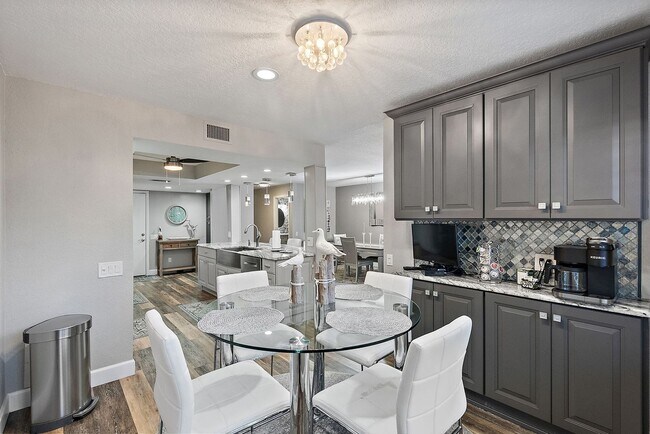 Building Photo - Two Bedroom/Two and a half bath gated townhome.