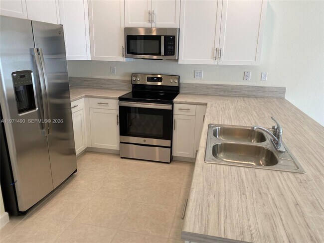 Building Photo - 11379 W 34th Wy.