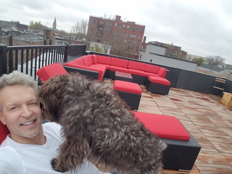 Me the owner and my Schnauzer Betty who stays downstairs with me - 165 New York Ave