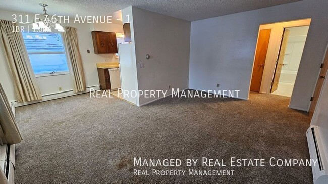 Building Photo - 311 E 46th Ave