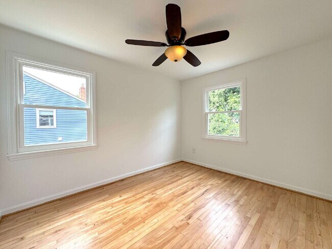 Building Photo - Charming 2BR Townhome with Finished Basement, Fenced Yard & Private Driveway Near Huntington Metro