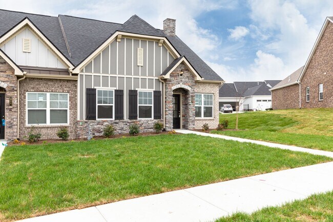 Building Photo - **BE THE LUCKY ONE TO LIVE IN THIS 2022-BUILT UPSCALE COTTAGE HOME IN THE PRESERVE AT BELLE POINTE**