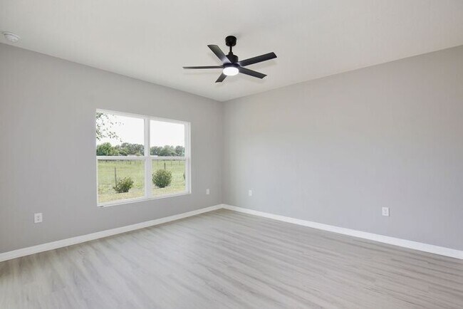 Building Photo - Move-In Ready 2BR/2BA Villa with Den + 2-Car Garage | Lake Nona Adjacent | Suncrest at St. Cloud