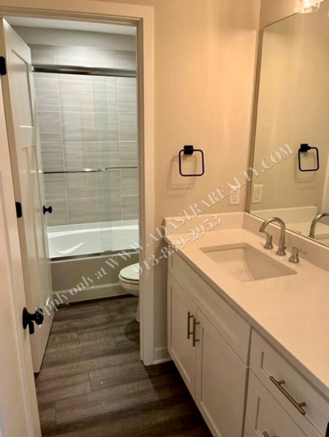 Building Photo - Spacious 4-Bedroom Townhome with Finished Basement in Blue Valley School District-Available NOW!!