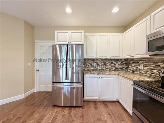 Building Photo - 5758 NE Damsel Dr