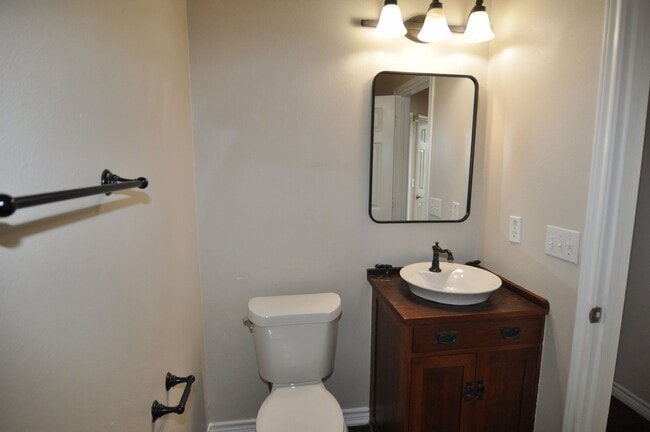 Building Photo - Welcome to this charming 3-2-2 brick home ...