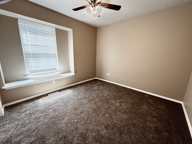 Building Photo - 4 Bedroom Home with Bonus Room Potential & RV Parking!