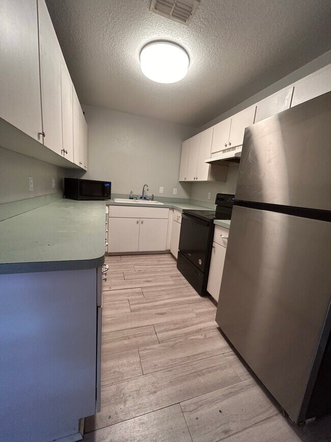 Building Photo - Quail Run Duplex