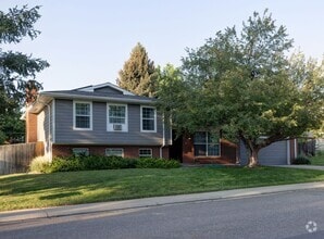 Building Photo - Spacious 4-Bedroom Home with Private Backy...