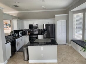 Building Photo - 7891 Manor Forest Blvd