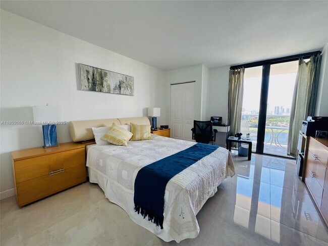 Building Photo - 3675 N Country Club Dr