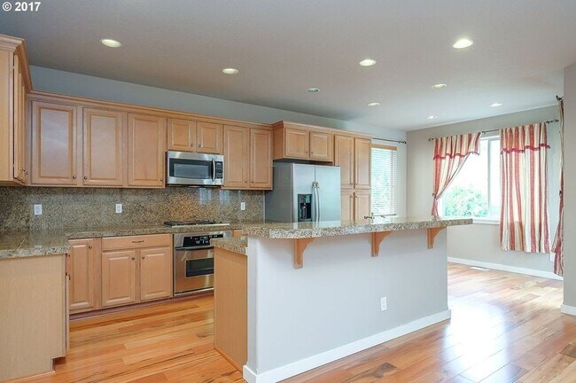 Building Photo - 6146 NE Ridgestone Ct