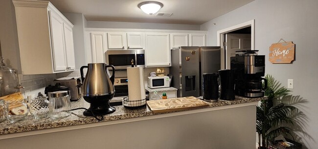 Building Photo - 7869 Ambassador Dr