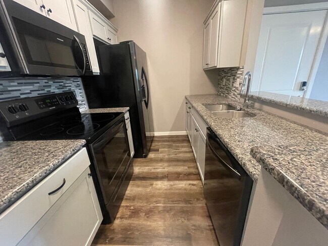 Building Photo - Partial Lake-view 1 Bedroom 1 Bath Walk-In Level Lakeside Apartment