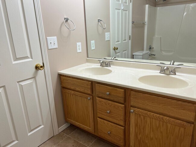 Building Photo - Very sharp 3 BR, 2.5 bathroom,  updated appliances, hardwood flooring