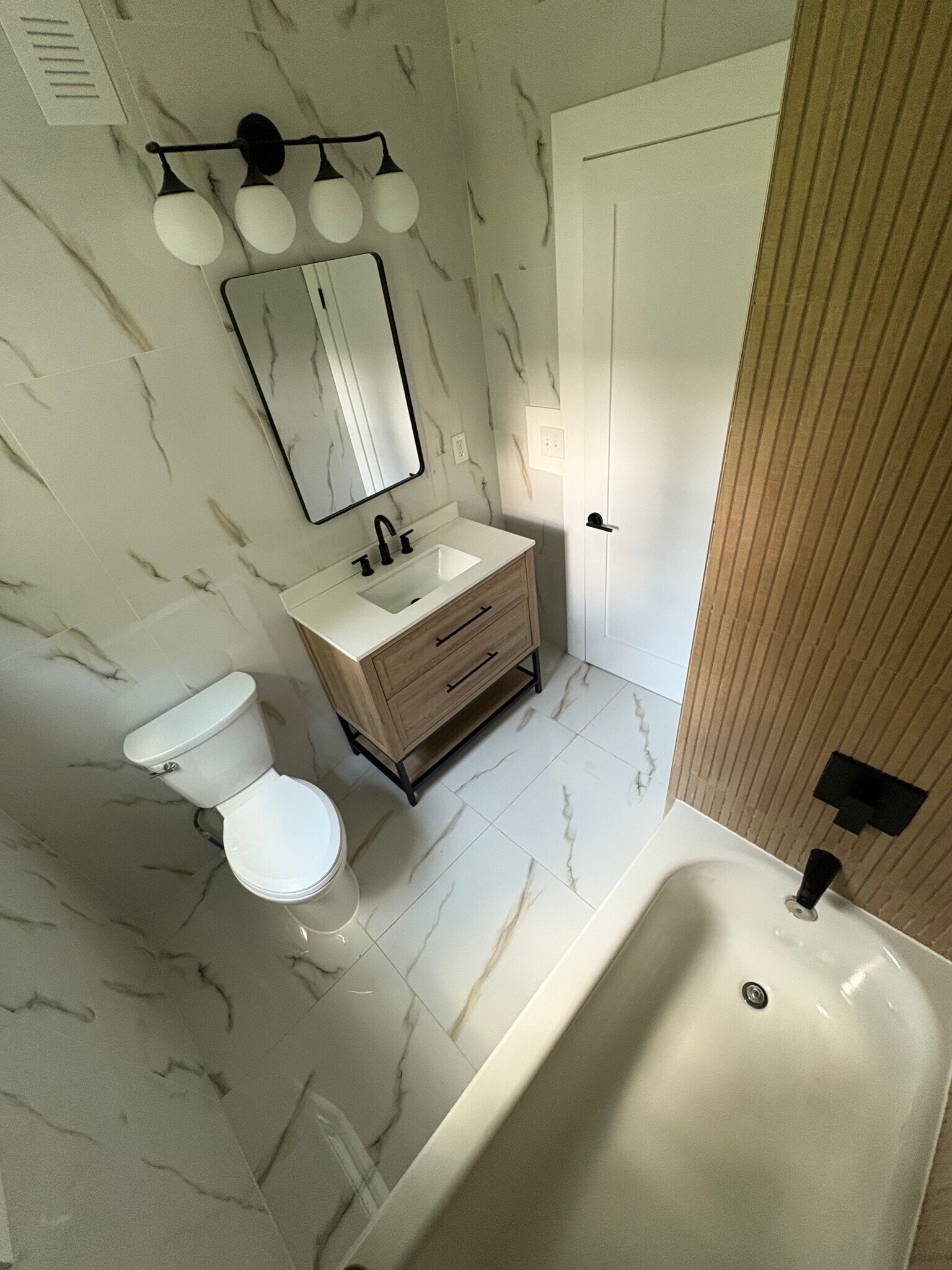 Full downstairs bathroom with marble - 117 Green Ln