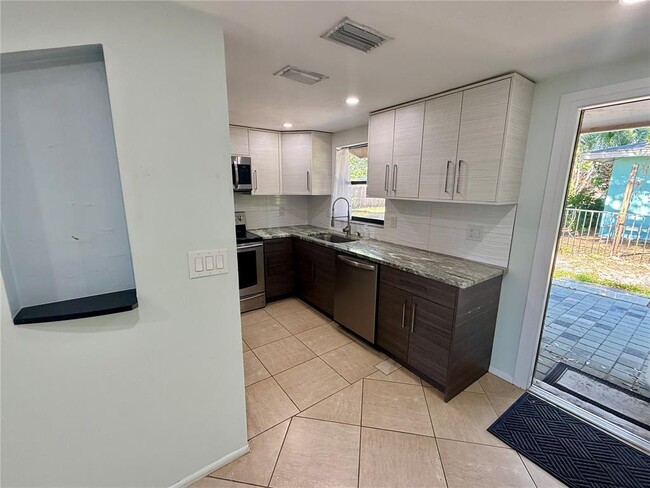 Building Photo - 5734 Olive Ave