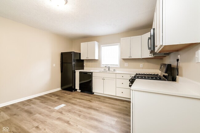 Building Photo - 3050 S Roena St