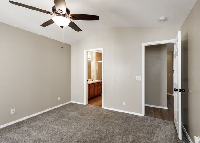 Building Photo - 3 Bed Top Floor Condo near Ft. Carson in Gated Community with detached Garage