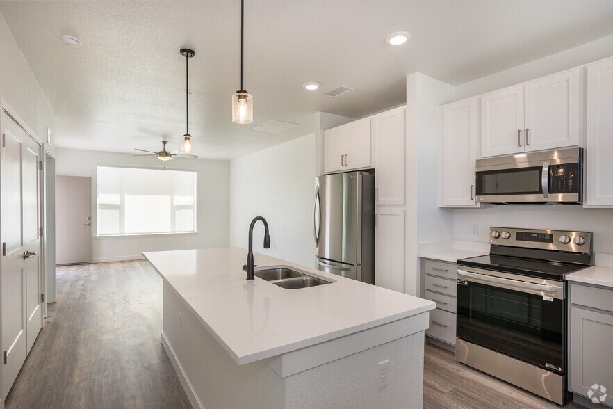 2BR, 2BA - 1,020SF - Kitchen / Living Room - Pine Ridge Crossings