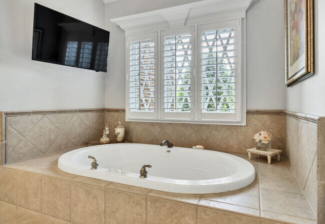 Building Photo - Fully Furnished 4 Bedroom, 3.5 Bath w/ 3 Car Garage and Unfinished Basement in Governors Club