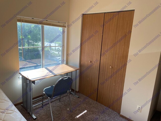 Building Photo - Furnished 4-Bedroom, 2-Bath Condo on Campus
