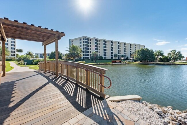 Building Photo - SEASONAL GORGEOUS BEACHFRONT HOME LOCATED ...