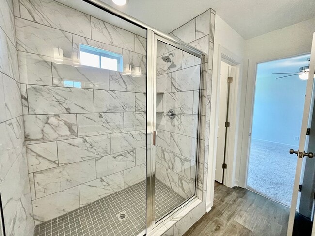 Building Photo - Practically New & Available NOW! Americana Luxury Townhomes! Pet Friendly! Attached Garage! All A...