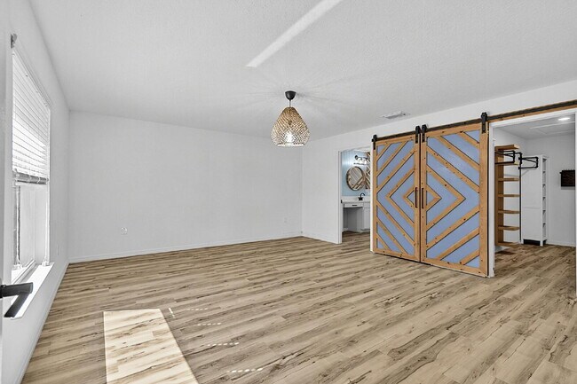 Building Photo - Modern 4-Bedroom, 3-Bath Home with Private In-Law Suite – Palm Coast, FL