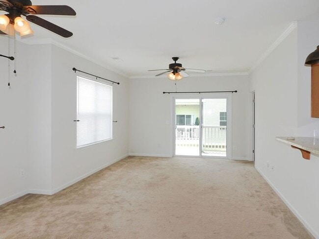 Building Photo - Pet Friendly Condo with Private Balcony and 1 Car Garage