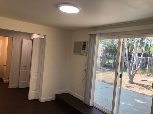 Living Room with door to back yard and AC - 9333 Lomita Dr
