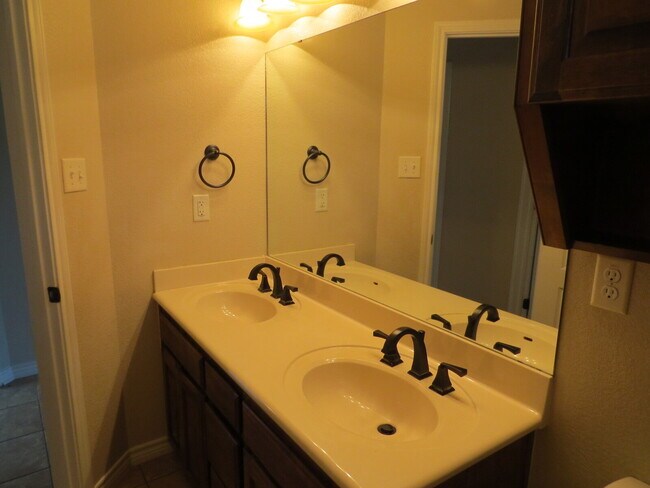 Building Photo - "Spacious 4-Bed Oasis in Killeen with Granite Touches & Cozy Fireplace!"
