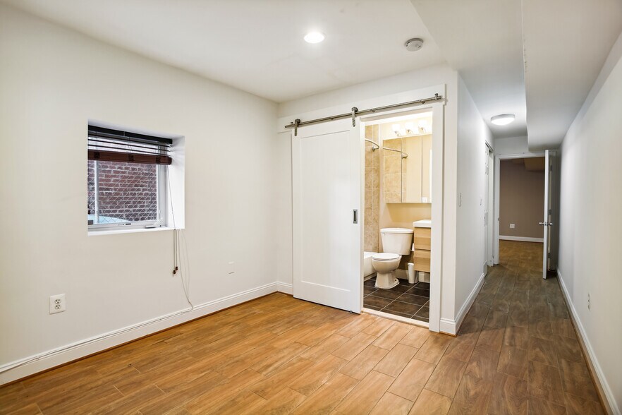 Rear master suite with barn door full bath - 76 R St NW