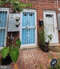 Building Photo - "Chic & Cozy 1-Bedroom Condo with Gleaming...
