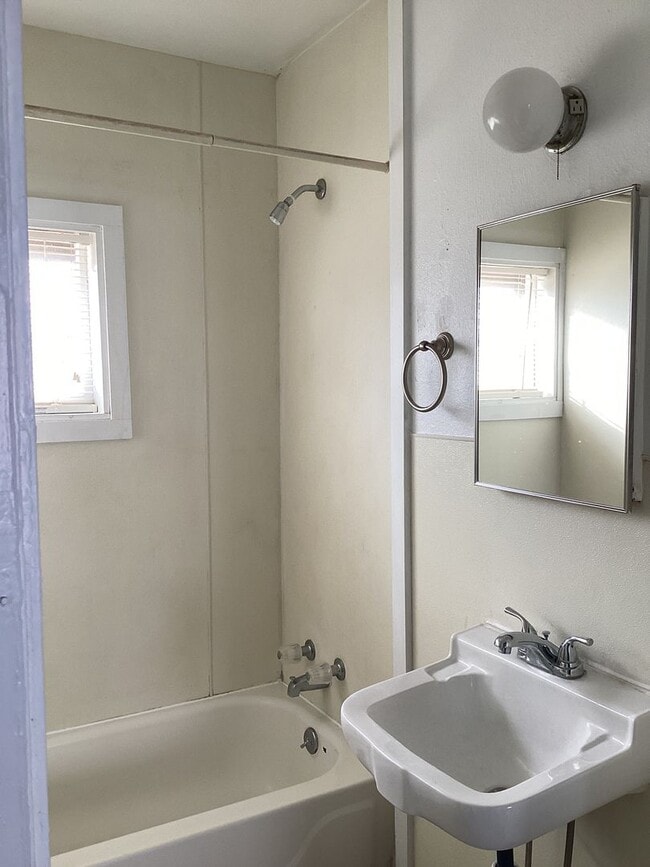 Building Photo - Freshly painted rooms in cute 2 bedroom home on quiet street!  Pets welcome!