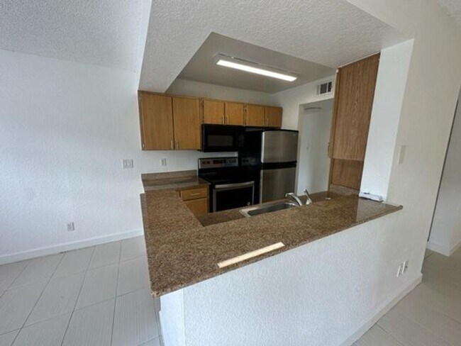Building Photo - 1st Floor 1 Bedroom and 1 Bathroom Condo  located in the Gated Community of Lexington Place