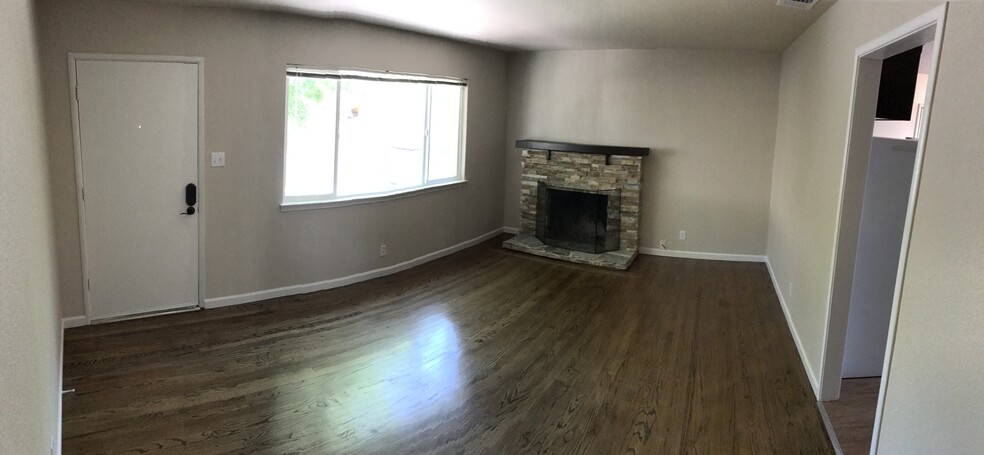 Family Room w/wood floors and Fireplace - 2150 Gunn Rd