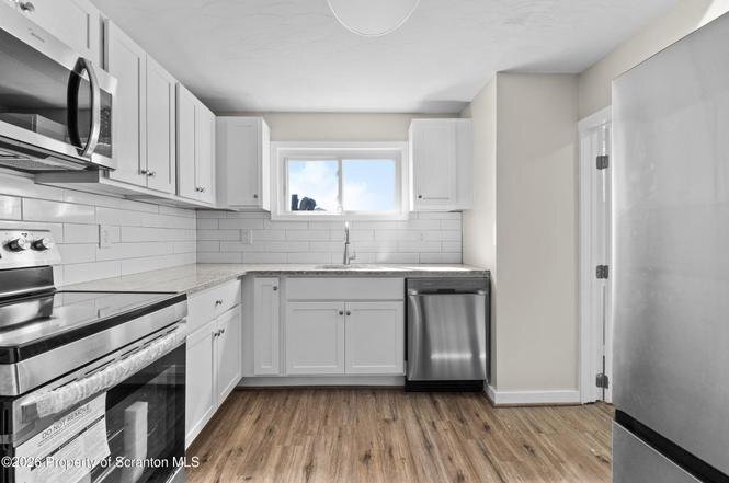 Building Photo - 302-304-304 Vine St