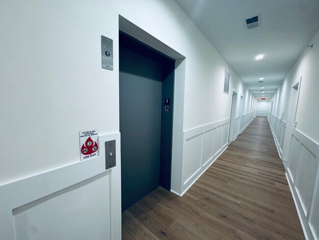 Building Photo - Brand New Luxury Condo - Top Floor