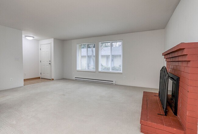 Building Photo - Condo Living with Fireplace and Fenced Yard!