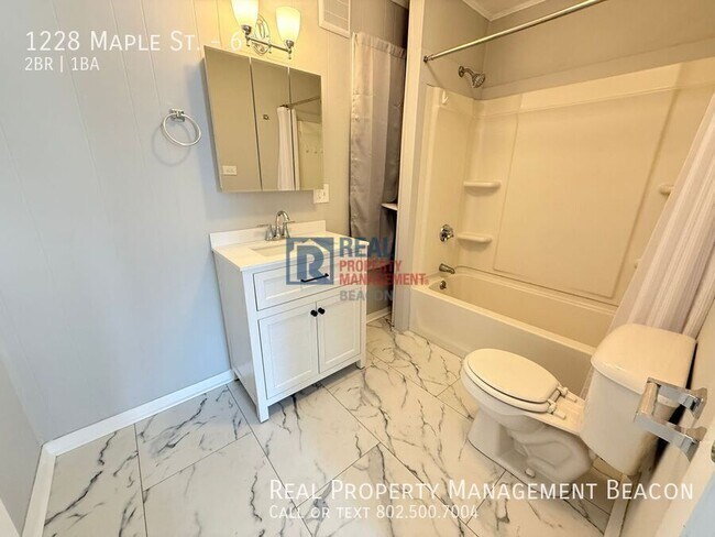 Building Photo - 1228 Maple St