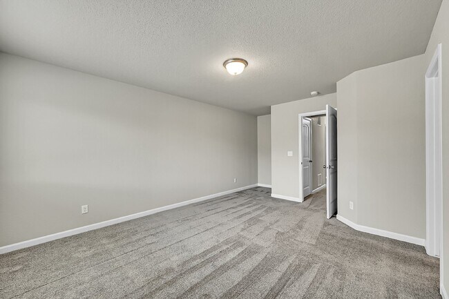 Building Photo - $2,040.95 -  3 bed, 2.5 bath Townhome in CO Springs with Central AC!