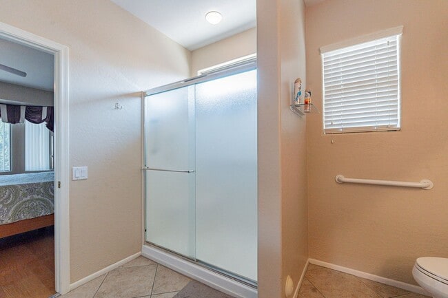 Building Photo - STUNNING Home with New AC in Exclusive 'Th...