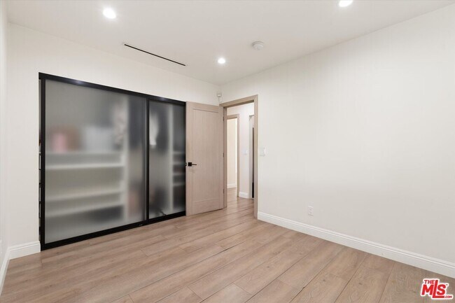 Building Photo - 11700 Woodley Ave