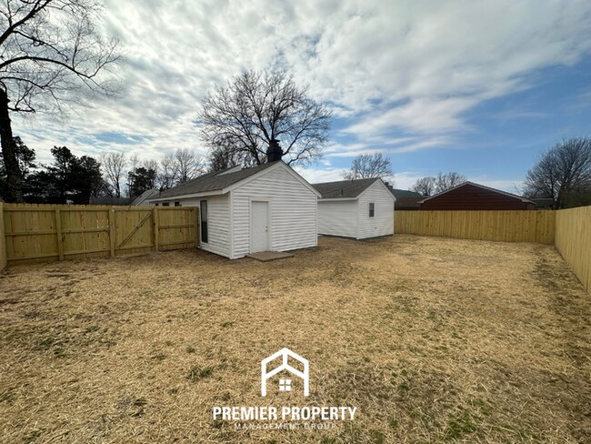 Building Photo - Quiet 3BR/2BA Cove Near Southwind | Soaring Ceilings & Floor-to-Ceiling Stone Fireplace