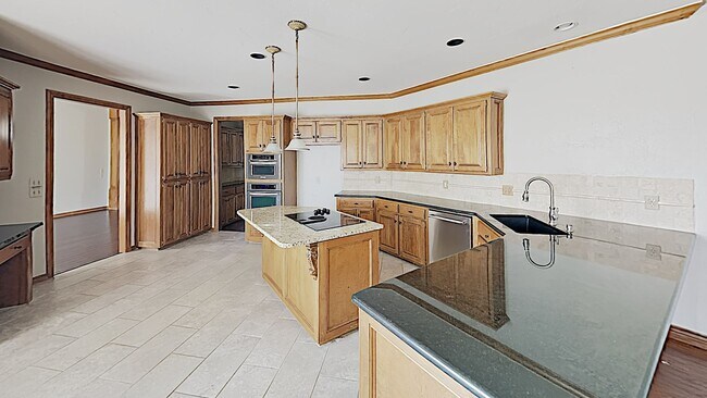 Building Photo - 4 Bedroom 3 Bathroom 3 Car Garage with Sto...