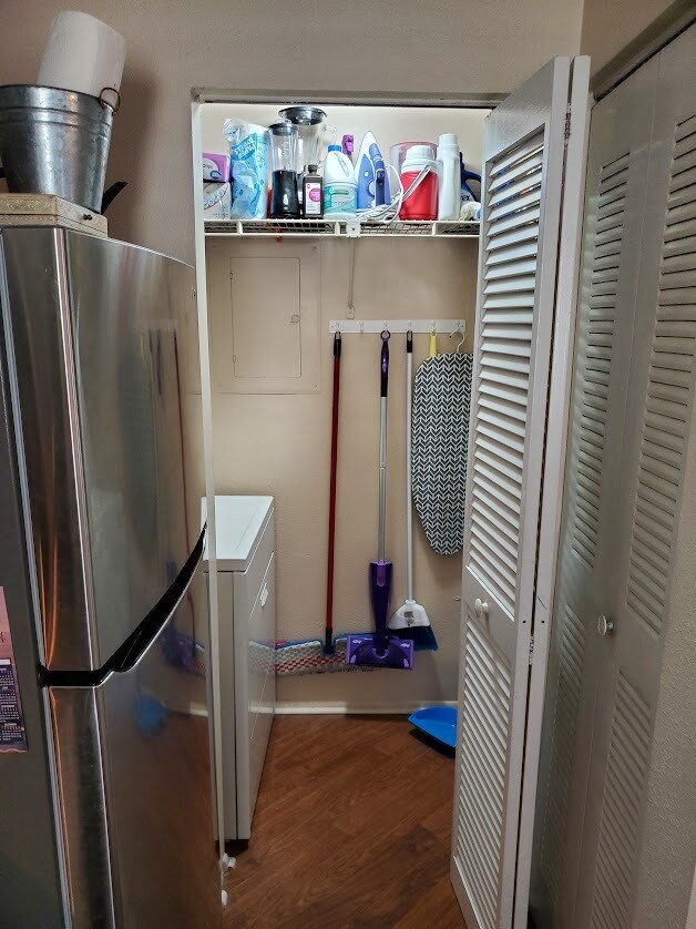 Laundry closet with shelves - 115 112th Ave NE