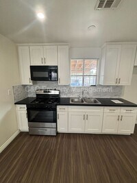 Building Photo - 7053 Lindley Ave